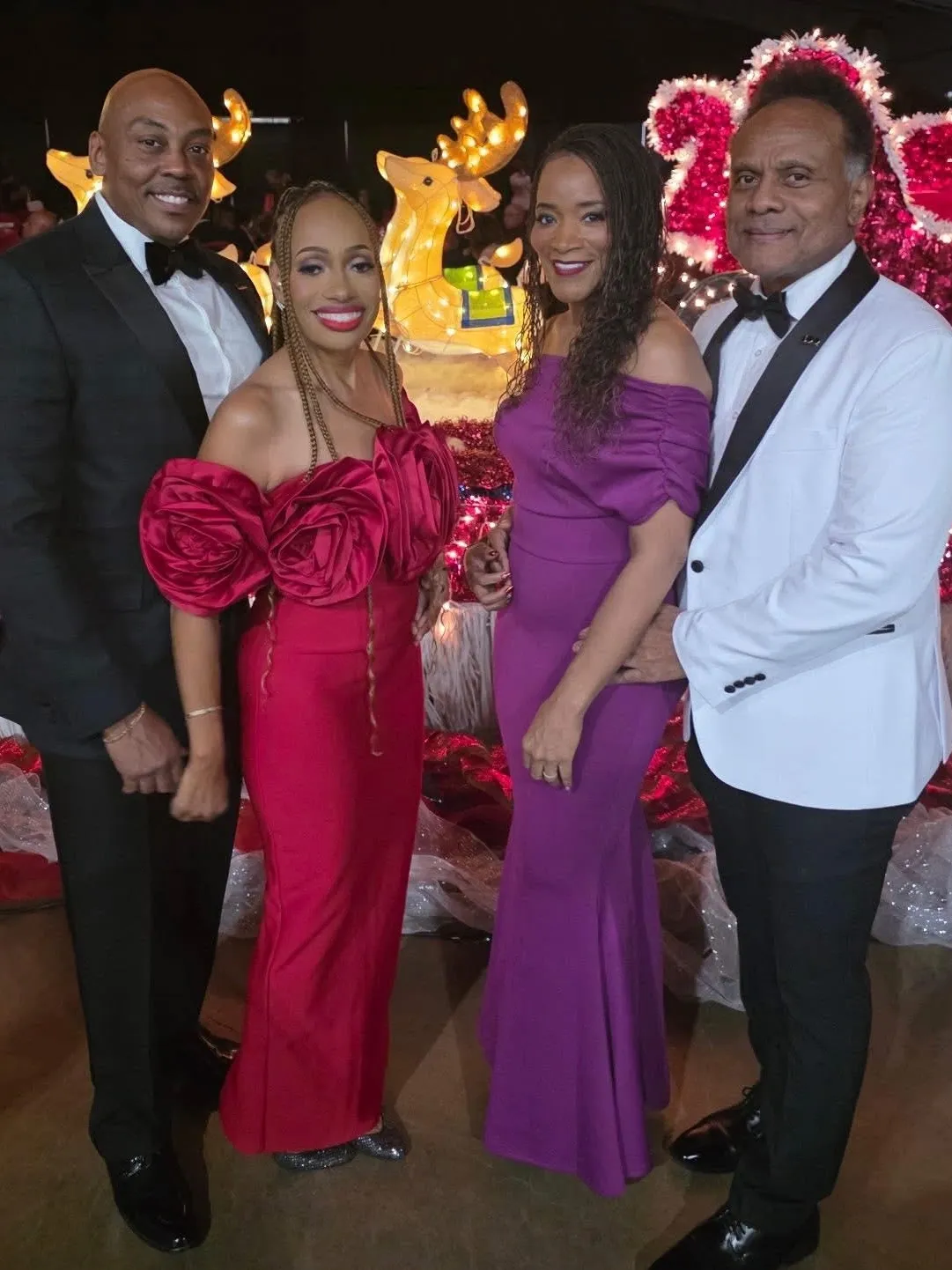 Elegant group posing with holiday decorations