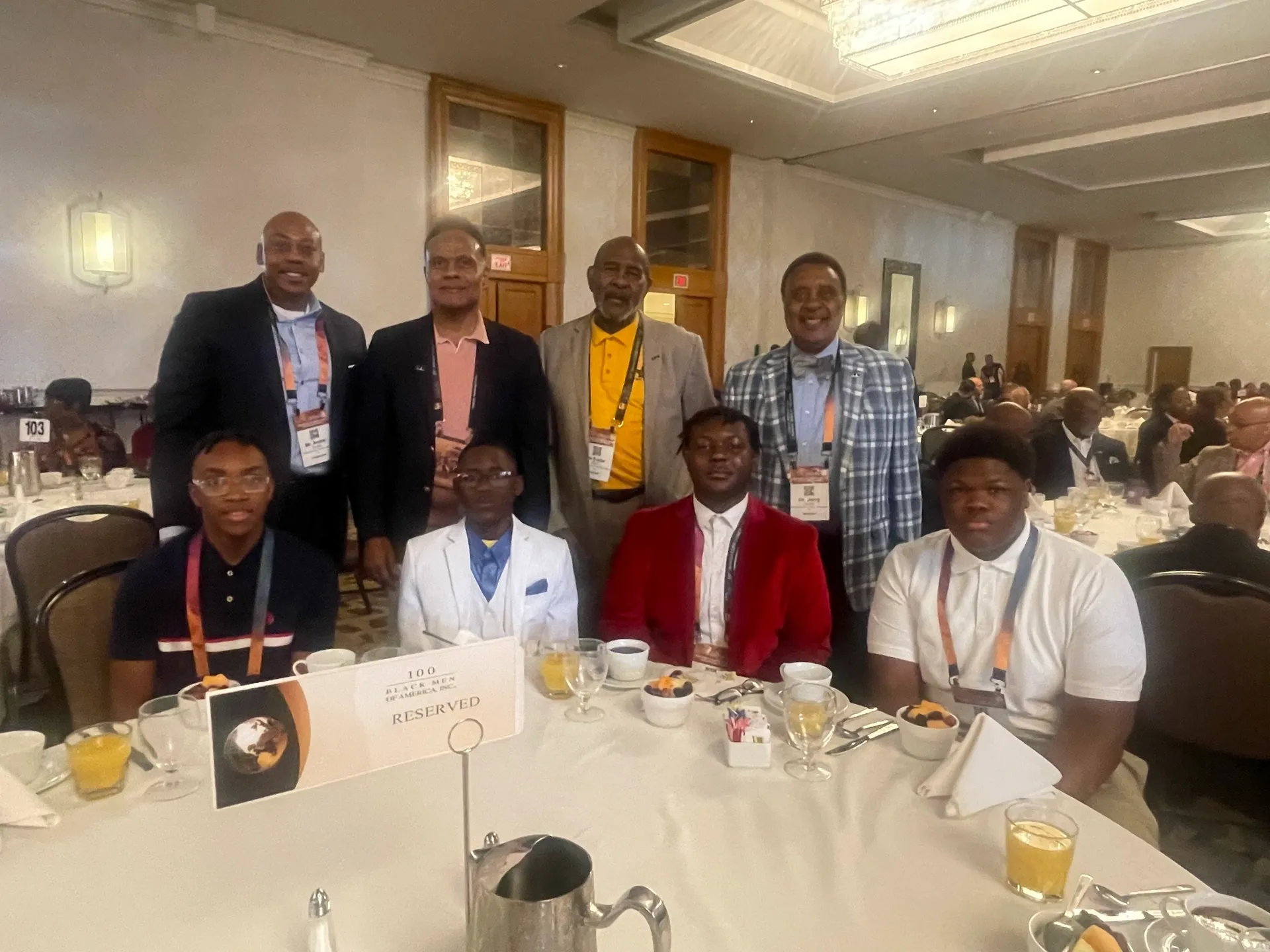 Smiling attendees at a conference gathering