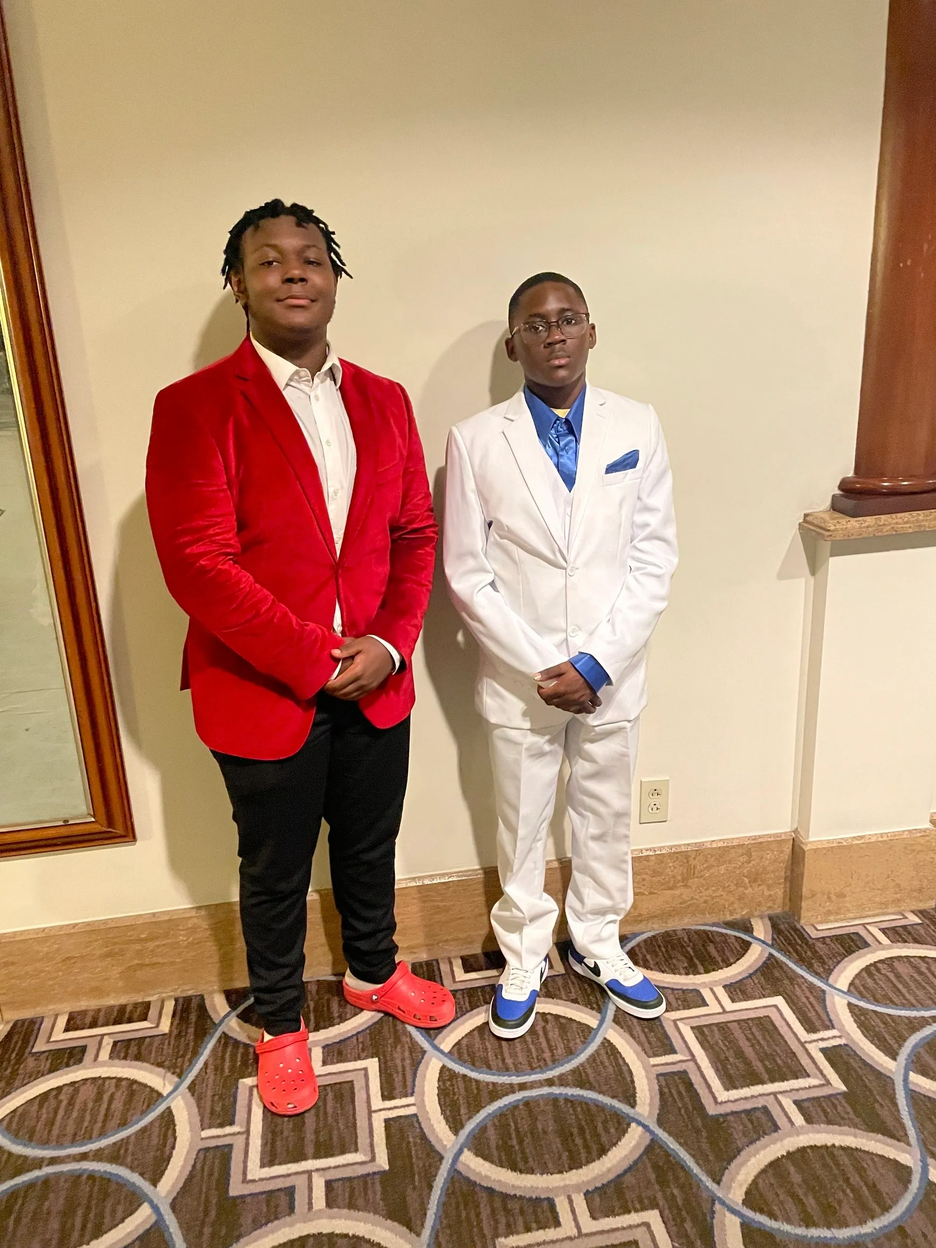 Friends posing in stylish outfits