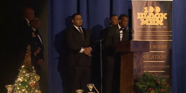 Formal gathering with Christmas tree